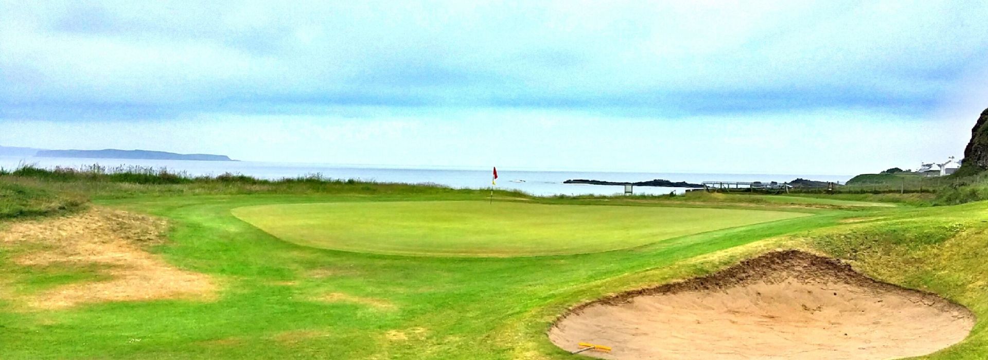 Golf course green and bunkers