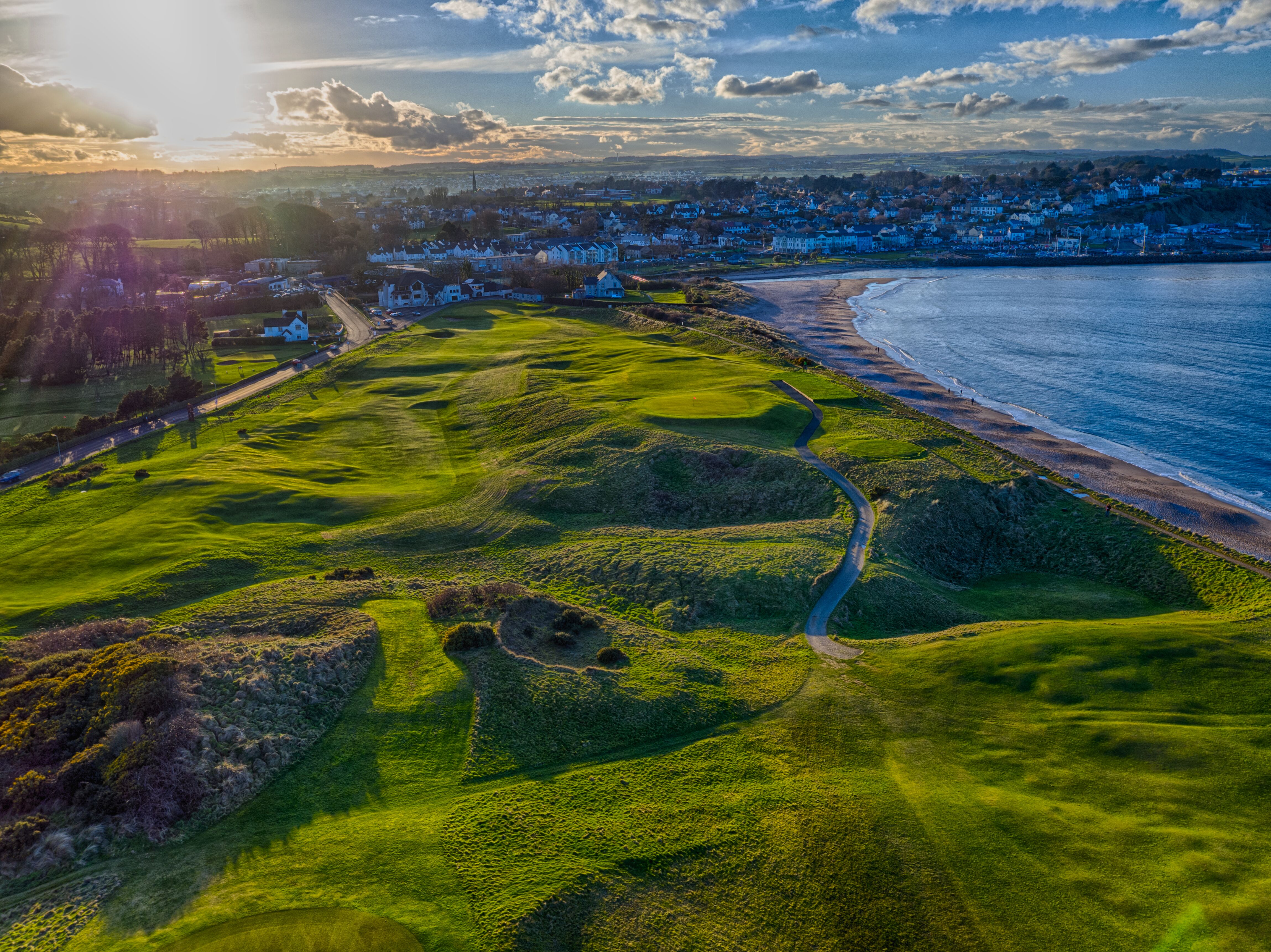 Golf course fairway against the coast